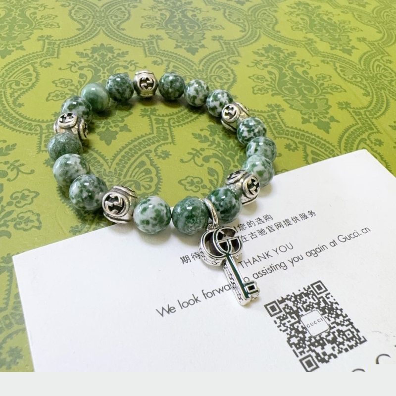 G*u*i bracelets